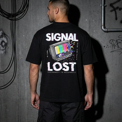 Zwart Signal Lost oversized T-shirt, achteraanzicht met glitchprint bij model #farbe_schwarz