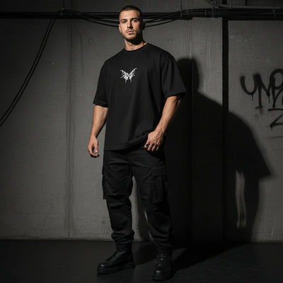 Zwart Tribal Techno Vibes oversized T-shirt met cargobroek, ten voeten uit bij model #farbe_schwarz